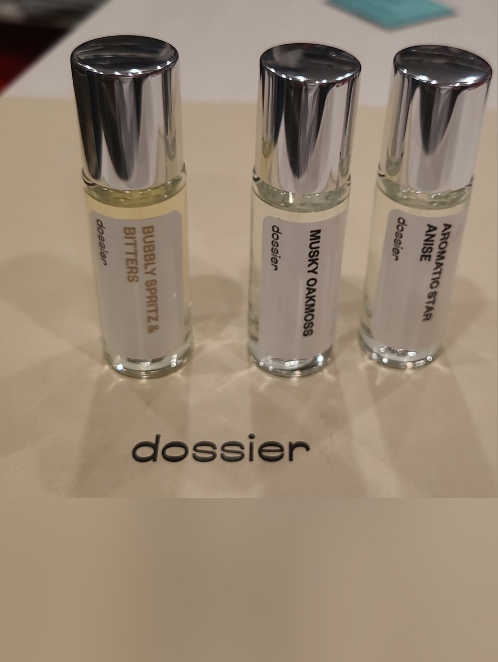 Dossier Parfum. Three 0.37 Fl. Oz  Spray Bottles